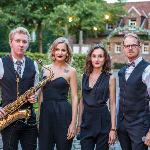 Groepsfoto van een muziekband